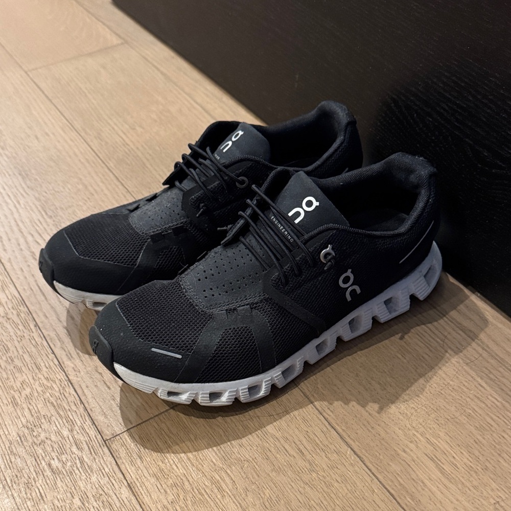 On Running Women’s Black and White Slip-on Sneakers